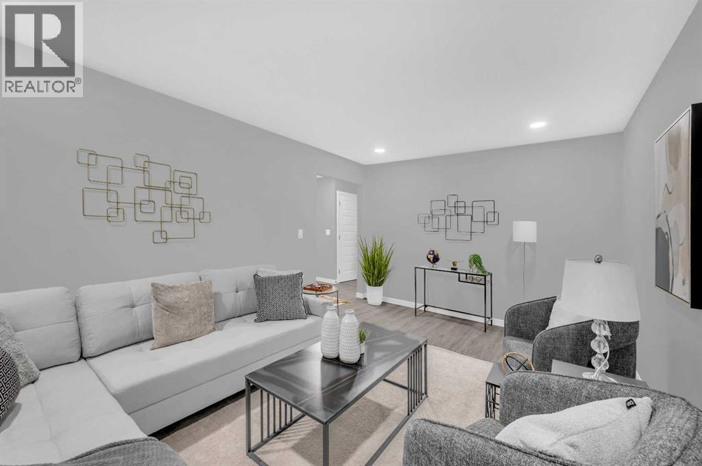 5868 Dalcastle Drive Nw, Calgary, AB - Indoor Photo Showing Living Room