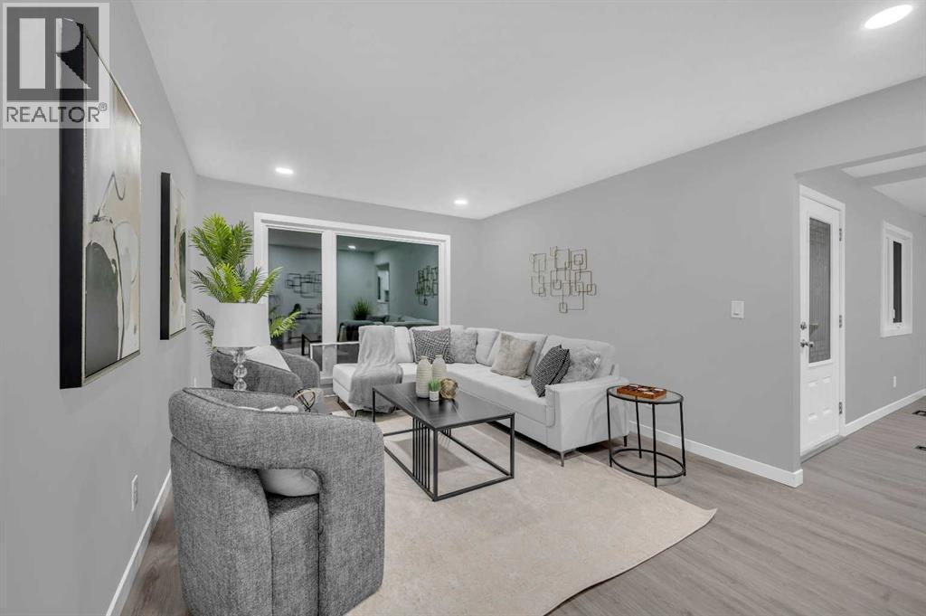 5868 Dalcastle Drive Nw, Calgary, AB - Indoor Photo Showing Living Room