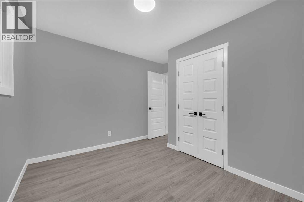 5868 Dalcastle Drive Nw, Calgary, AB - Indoor Photo Showing Other Room