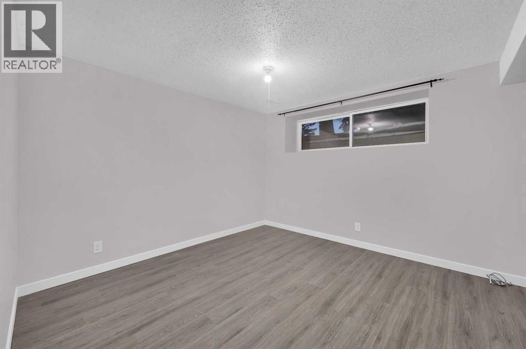 5868 Dalcastle Drive Nw, Calgary, AB - Indoor Photo Showing Other Room