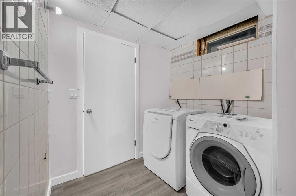 5868 Dalcastle Drive Nw, Calgary, AB - Indoor Photo Showing Laundry Room