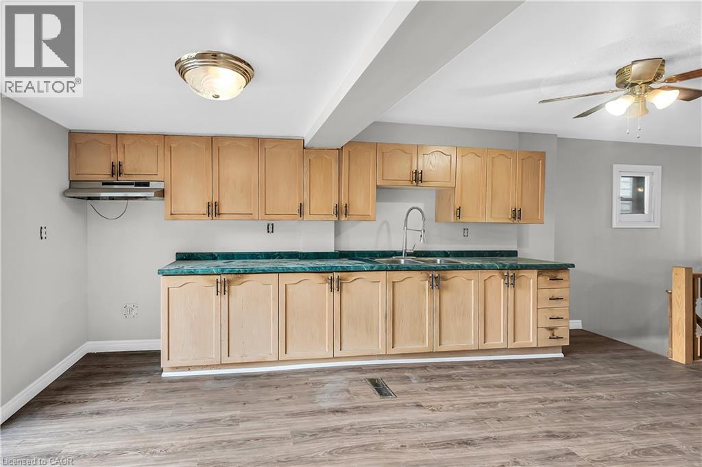 1256 Cannon Street E, Hamilton, ON - Indoor Photo Showing Kitchen With Double Sink