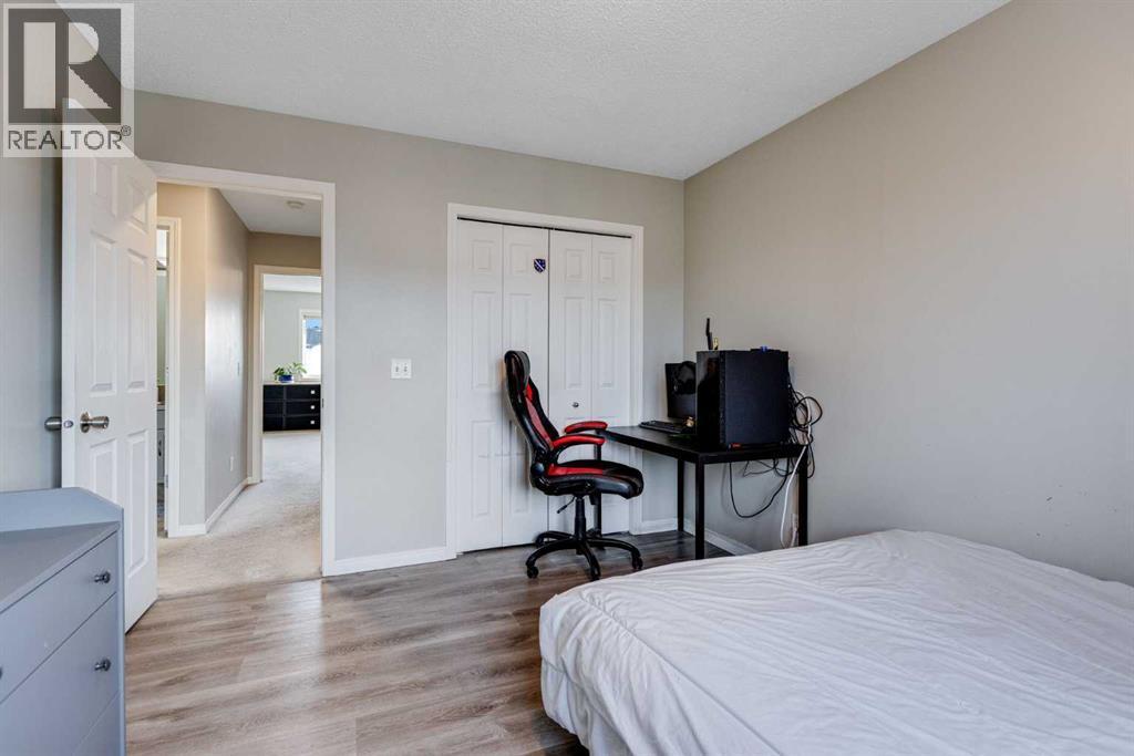 36 Bridlecrest Street Sw, Calgary, AB - Indoor Photo Showing Bedroom