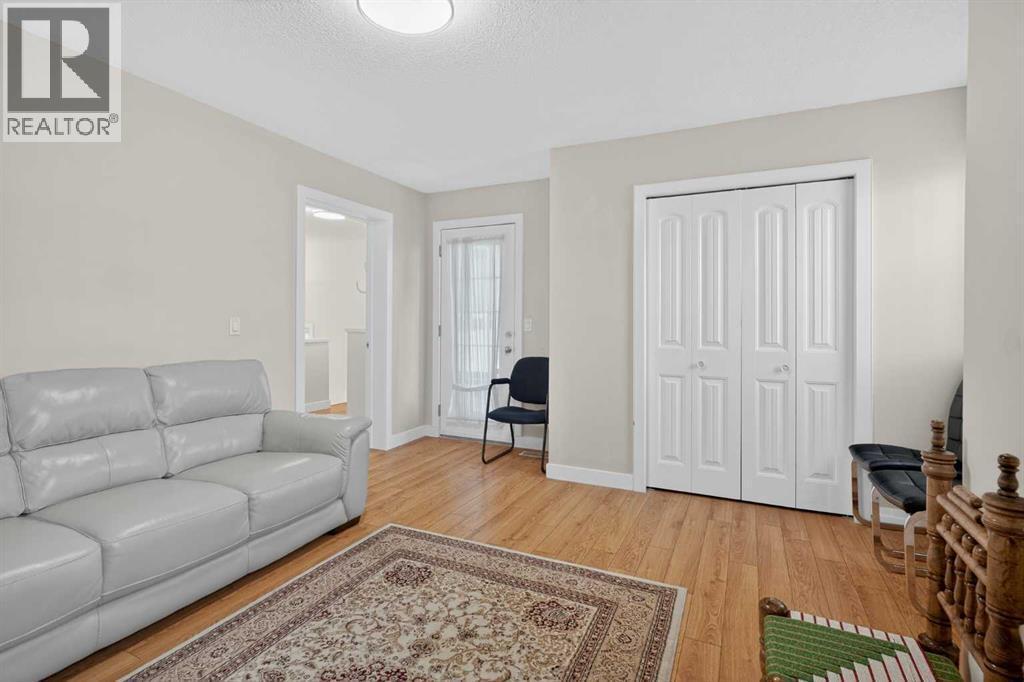 143 Taralake Way Ne, Calgary, AB - Indoor Photo Showing Living Room