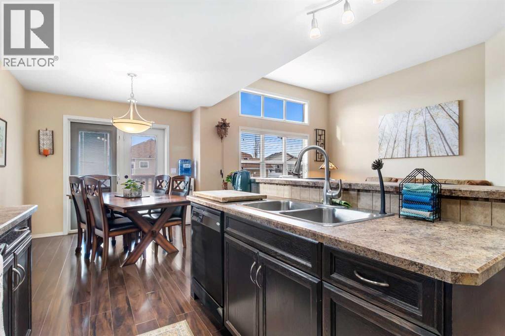 22 Morton Close, Penhold, AB - Indoor Photo Showing Kitchen With Double Sink