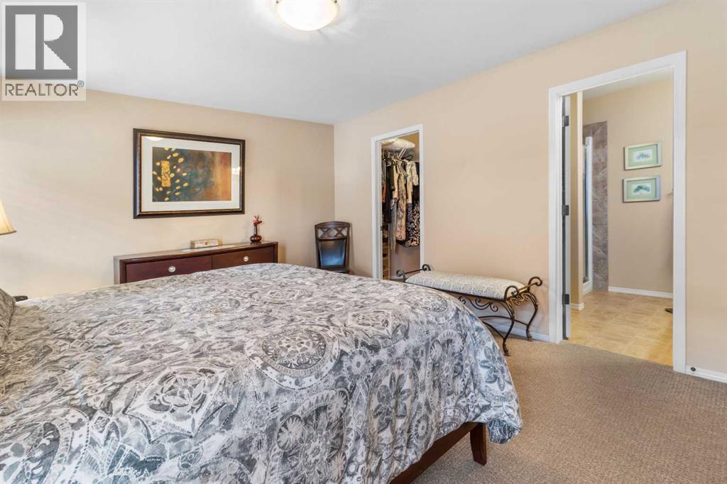 22 Morton Close, Penhold, AB - Indoor Photo Showing Bedroom