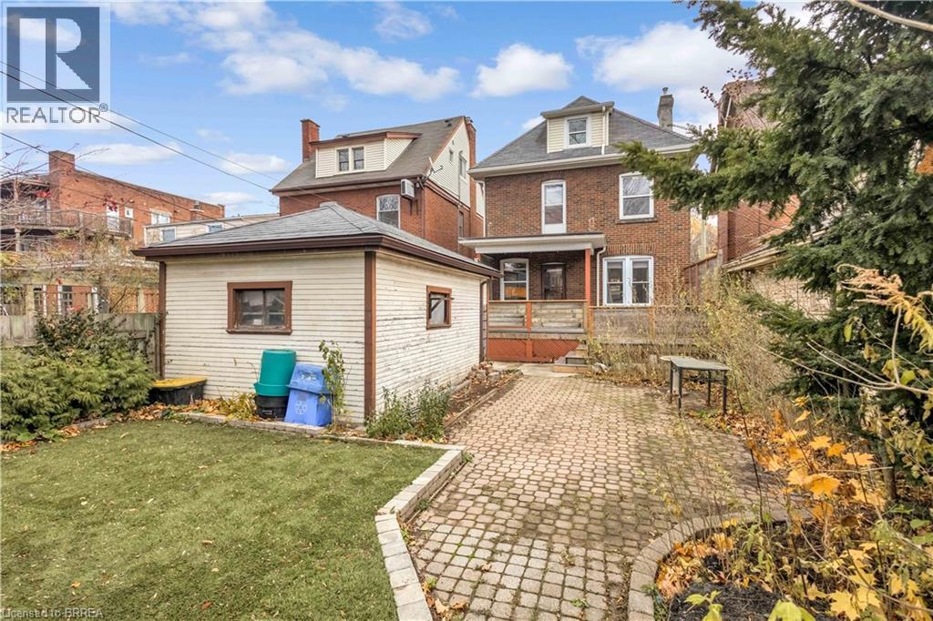 Rear view of house with brick siding - 134 Sherman Avenue S, Hamilton, ON - Outdoor
