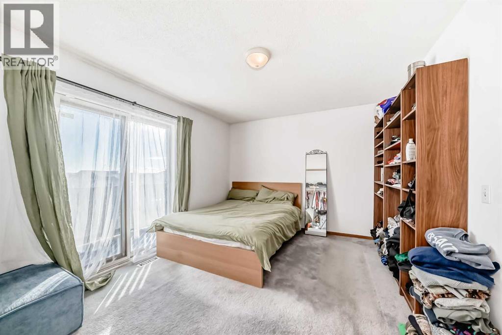 142 Hunterhorn Drive Ne, Calgary, AB - Indoor Photo Showing Bedroom