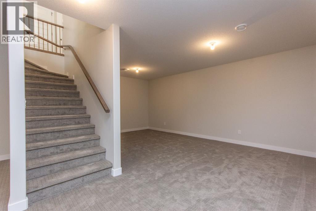 Photos and renderings are examples from a similar home built previously and do not necessarily reflect finished and colours used in this home - 37 Terra Close, Red Deer, AB - Indoor Photo Showing Other Room