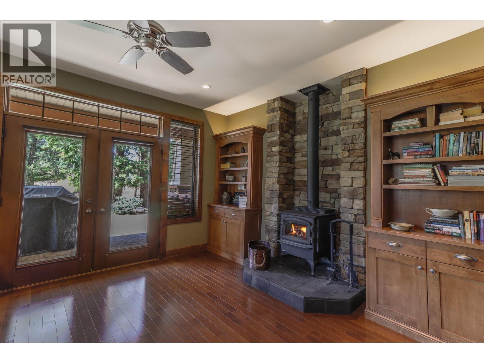 6308 Ash Road, Wasa, BC - Indoor Photo Showing Other Room With Fireplace