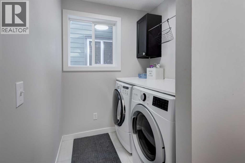 239 Chapalina Place Se, Calgary, AB - Indoor Photo Showing Laundry Room