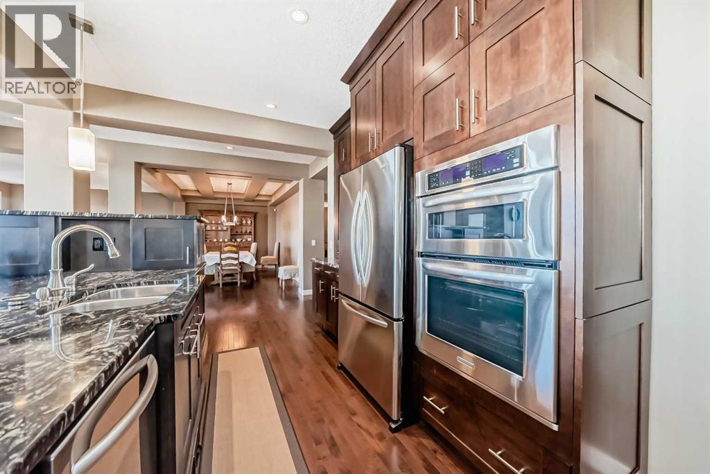 49 Crestridge View Sw, Calgary, AB - Indoor Photo Showing Kitchen With Double Sink With Upgraded Kitchen