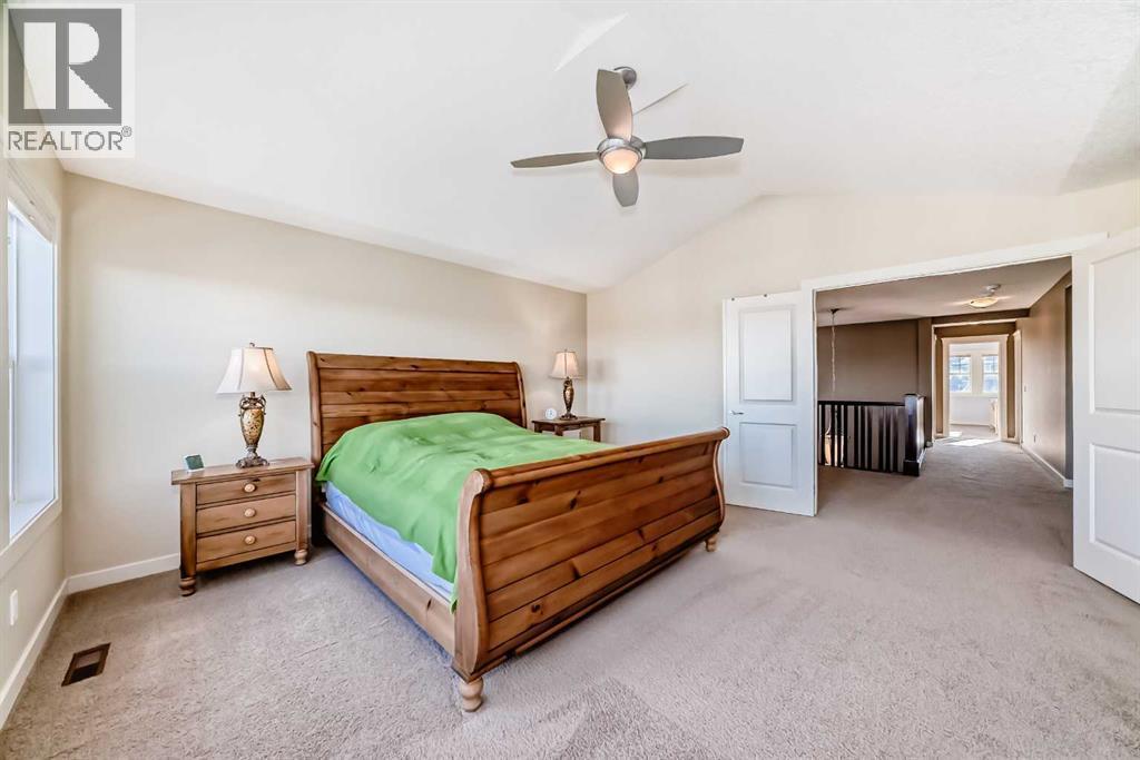 49 Crestridge View Sw, Calgary, AB - Indoor Photo Showing Bedroom