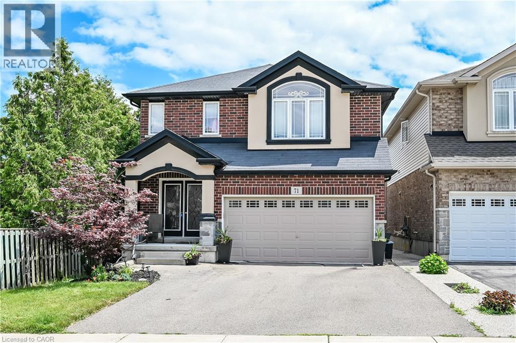 Brick and stucco facade with dark trim accents - 71 Jessica Street, Hamilton, ON - Outdoor With Facade