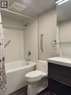 Renovated bathroom has a huge soaker tub and extra storage in the mirror -