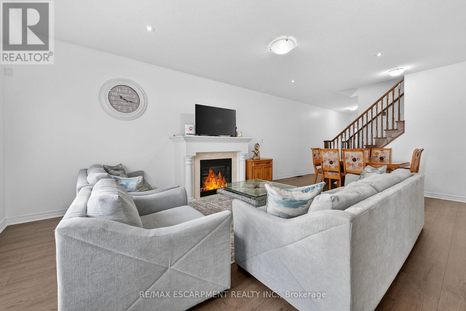 63 Chamomile Drive, Hamilton, ON - Indoor Photo Showing Living Room With Fireplace