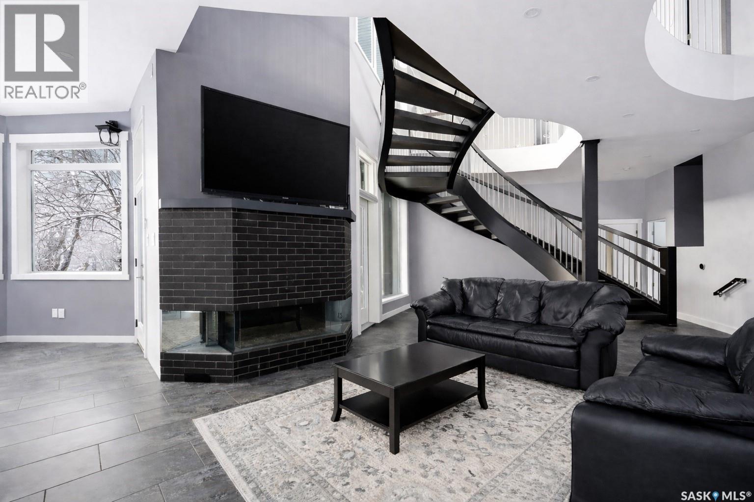 3601 Grassick Avenue, Regina, SK - Indoor Photo Showing Living Room With Fireplace