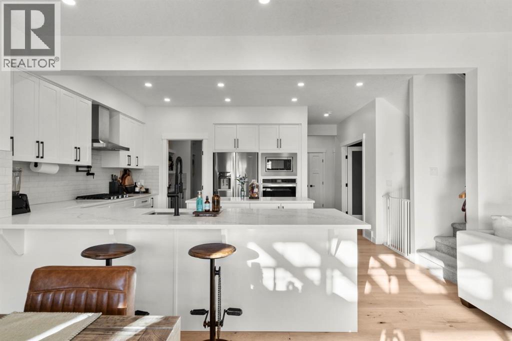 116 Ranchers View, Okotoks, AB - Indoor Photo Showing Kitchen With Upgraded Kitchen