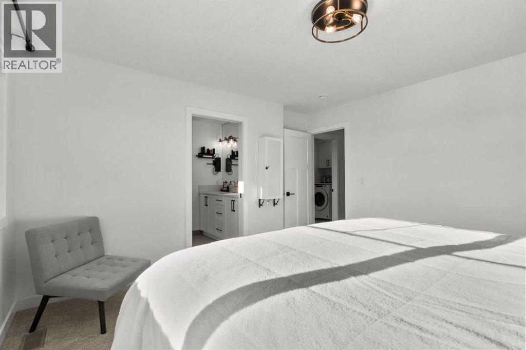 116 Ranchers View, Okotoks, AB - Indoor Photo Showing Bedroom