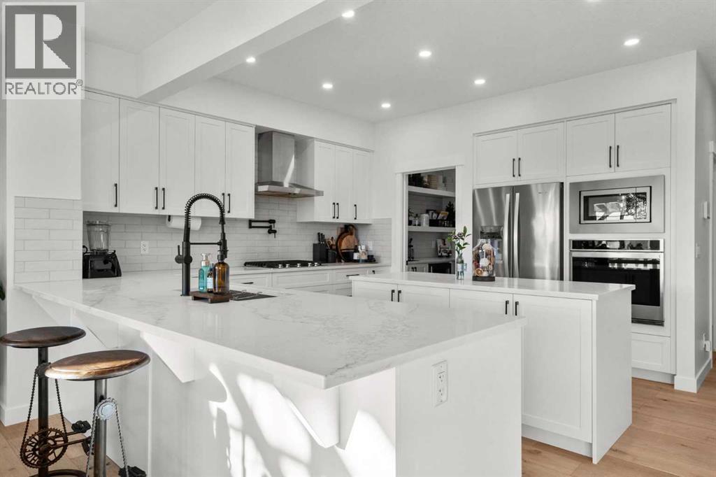 116 Ranchers View, Okotoks, AB - Indoor Photo Showing Kitchen With Upgraded Kitchen