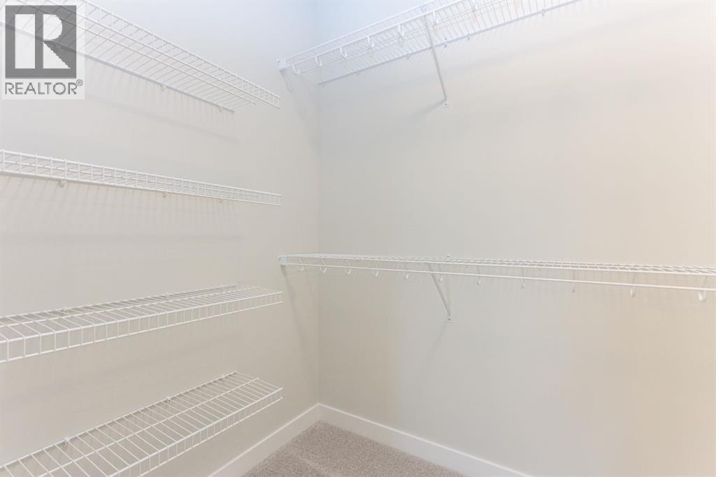 Photos and renderings are examples from a similar home built previously and do not necessarily reflect finished and colours used in this home - 41 Terra Close, Red Deer, AB - Indoor With Storage