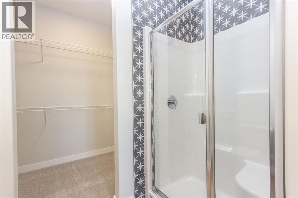 Photos and renderings are examples from a similar home built previously and do not necessarily reflect finished and colours used in this home - 41 Terra Close, Red Deer, AB - Indoor Photo Showing Bathroom