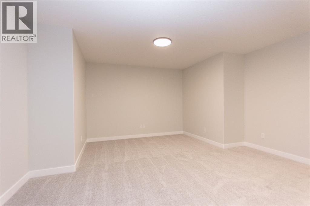 Photos and renderings are examples from a similar home built previously and do not necessarily reflect finished and colours used in this home - 41 Terra Close, Red Deer, AB - Indoor Photo Showing Other Room