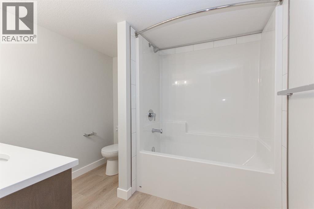 Photos and renderings are examples from a similar home built previously and do not necessarily reflect finished and colours used in this home - 41 Terra Close, Red Deer, AB - Indoor Photo Showing Bathroom