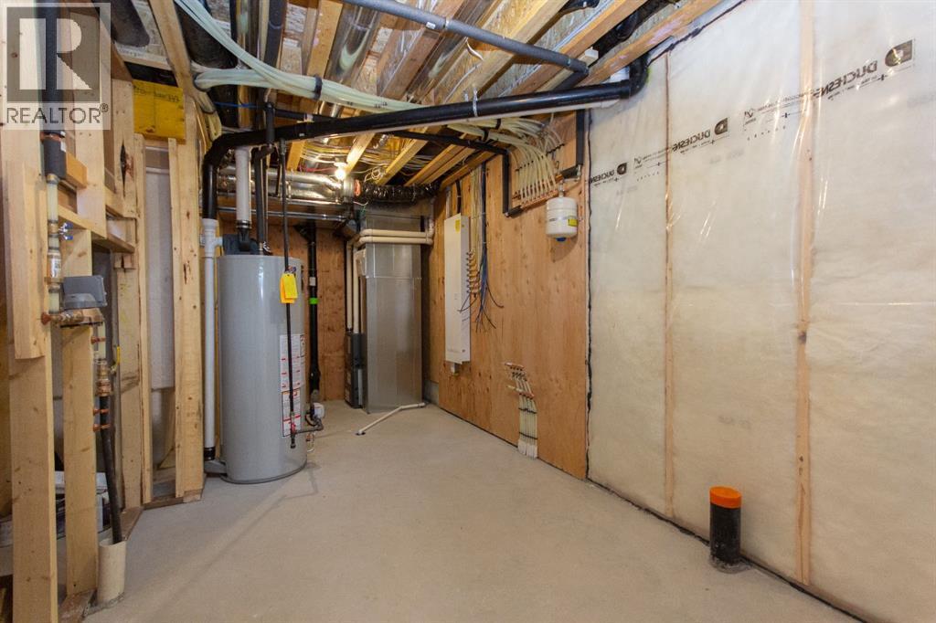 Photos and renderings are examples from a similar home built previously and do not necessarily reflect finished and colours used in this home - 41 Terra Close, Red Deer, AB - Indoor Photo Showing Basement