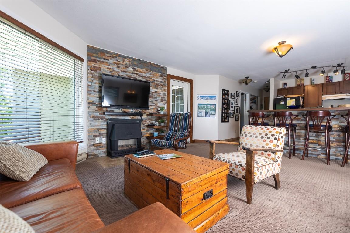 121-4559 Timberline Crescent, Fernie, BC - Indoor Photo Showing Living Room With Fireplace