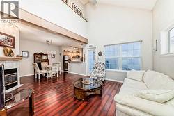 Living room looking toward dining room and kitchen -