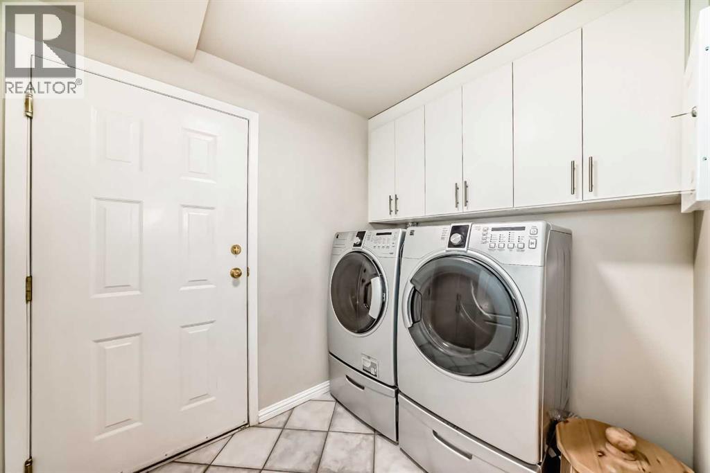 Laundry/ mudroom - 1906 Patterson View Sw, Calgary, AB - Indoor Photo Showing Laundry Room