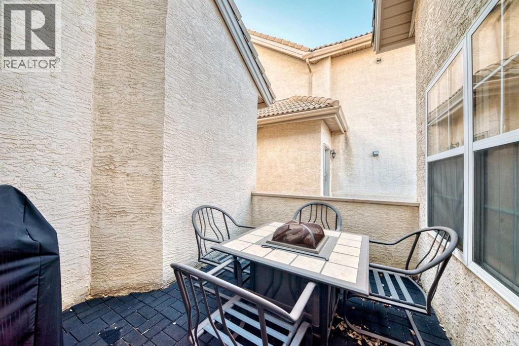 Private patio - 1906 Patterson View Sw, Calgary, AB - Outdoor With Exterior