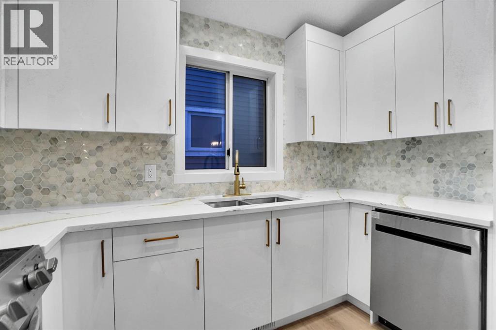 96 Covington Road Ne, Calgary, AB - Indoor Photo Showing Kitchen With Double Sink
