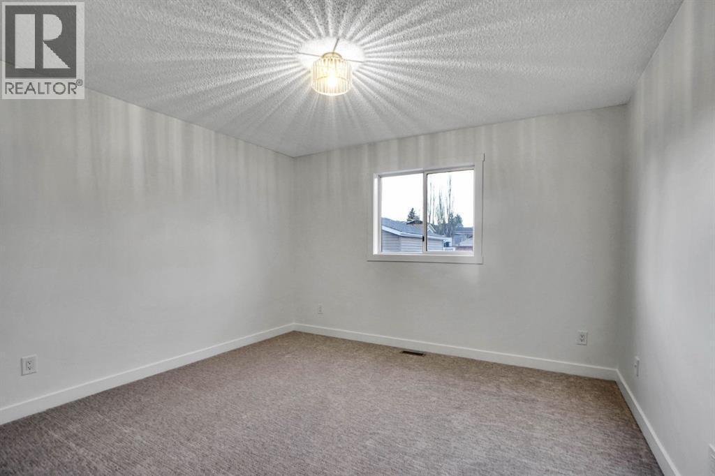 96 Covington Road Ne, Calgary, AB - Indoor Photo Showing Other Room