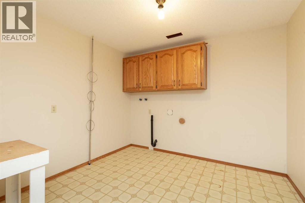Laundry area - 83 Elm Crescent S, Lethbridge, AB - Indoor Photo Showing Other Room