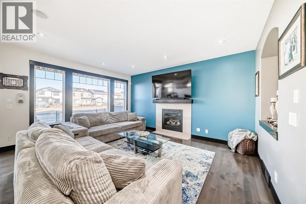 16 Skyview Shores Gardens Ne, Calgary, AB - Indoor Photo Showing Living Room With Fireplace