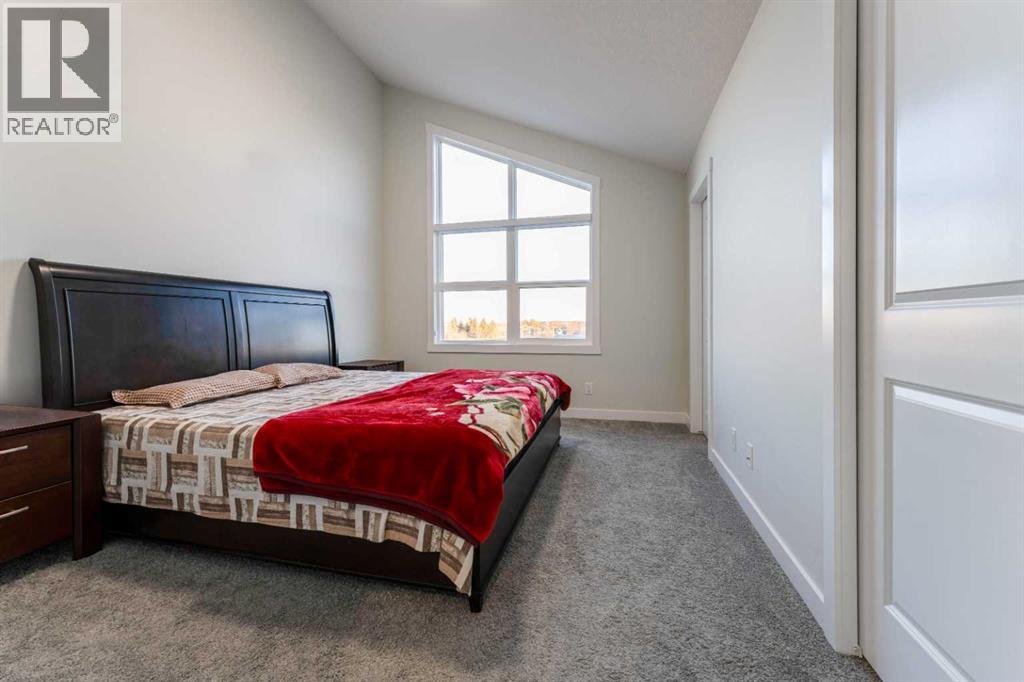 449 Chinook Winds View Sw, Airdrie, AB - Indoor Photo Showing Bedroom