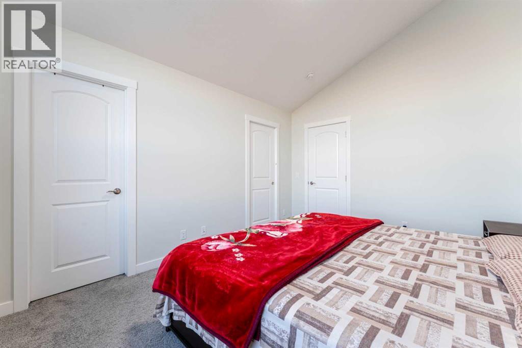 449 Chinook Winds View Sw, Airdrie, AB - Indoor Photo Showing Bedroom