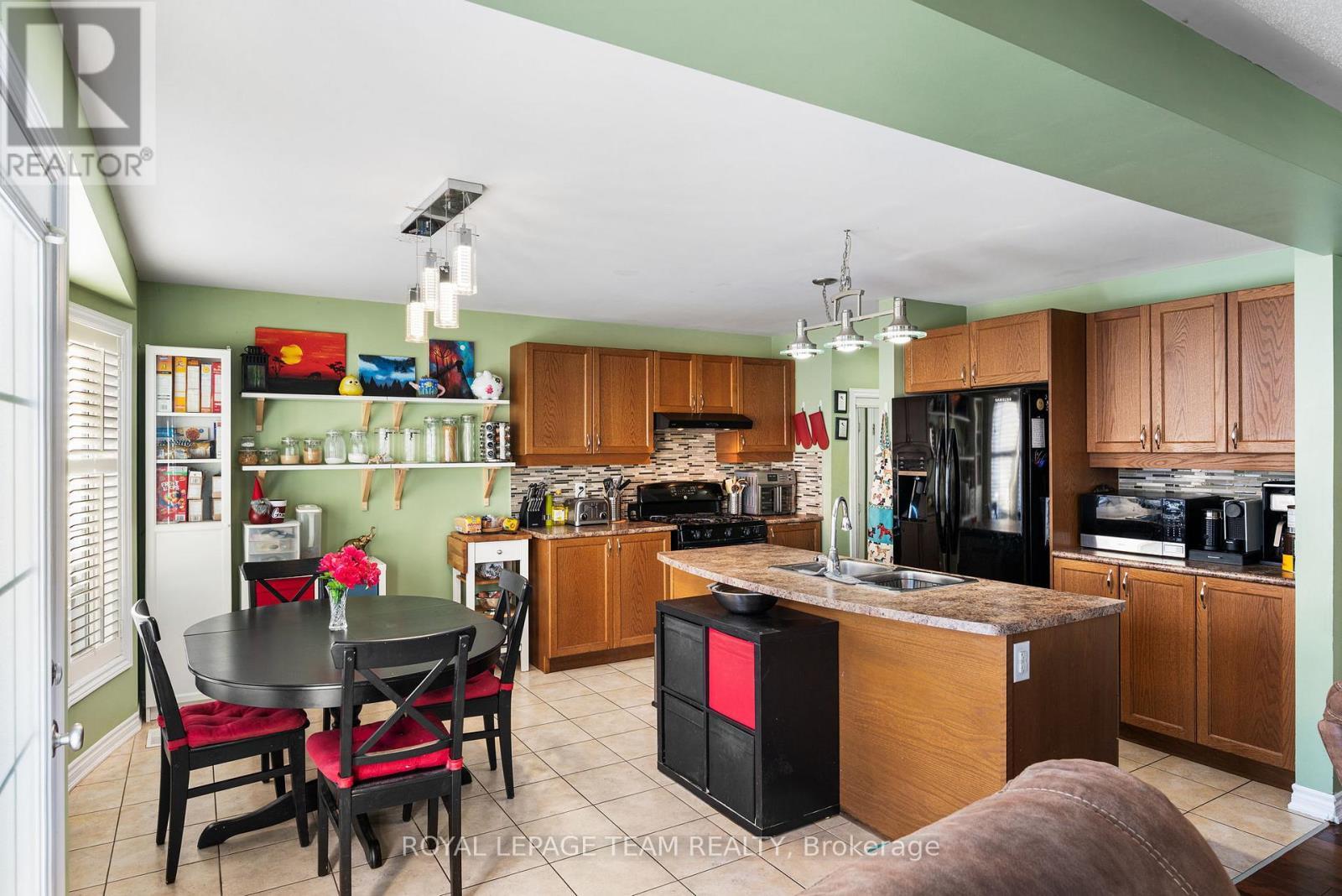 Dining and Kitchen Area with Centre Island - 3022 Freshwater Way, Ottawa, ON - Indoor Photo Showing Other Room