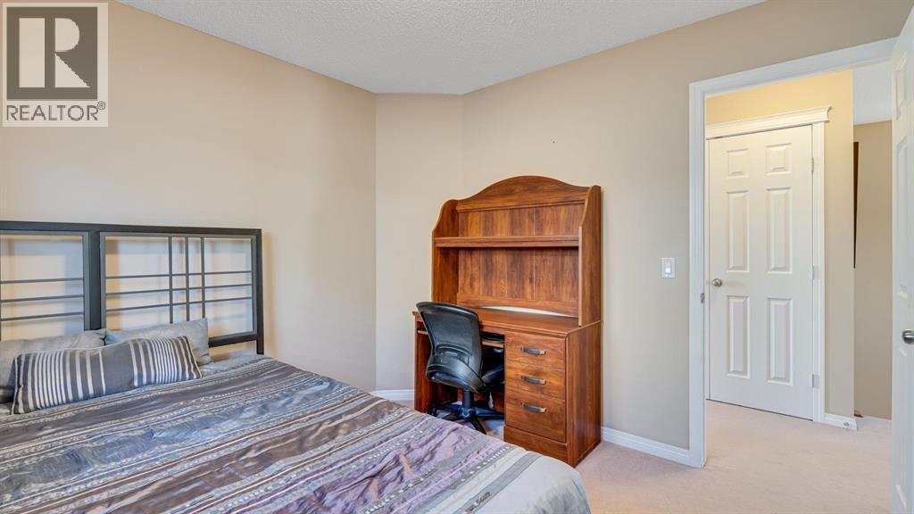 157 Bridleridge View Sw, Calgary, AB - Indoor Photo Showing Bedroom