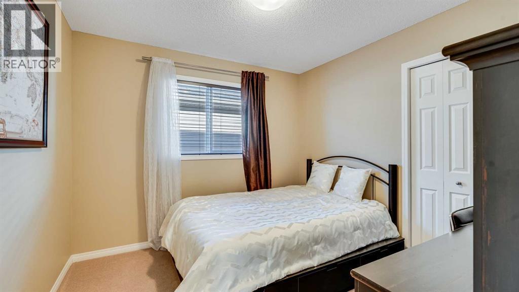 157 Bridleridge View Sw, Calgary, AB - Indoor Photo Showing Bedroom