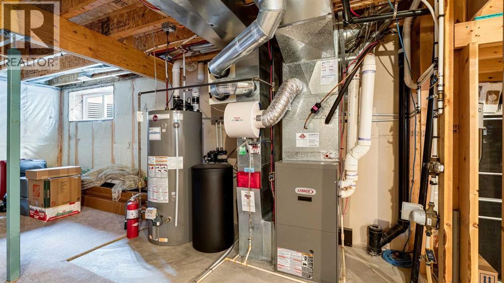 157 Bridleridge View Sw, Calgary, AB - Indoor Photo Showing Basement