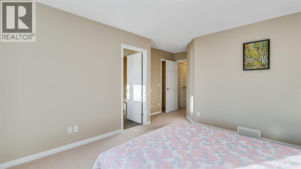 157 Bridleridge View Sw, Calgary, AB - Indoor Photo Showing Bedroom