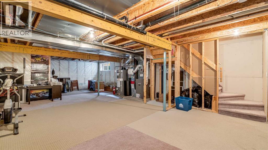 157 Bridleridge View Sw, Calgary, AB - Indoor Photo Showing Basement