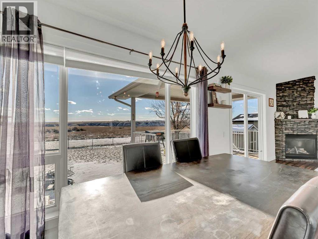 122 Redcliff Way Sw, Redcliff, AB - Indoor With Fireplace