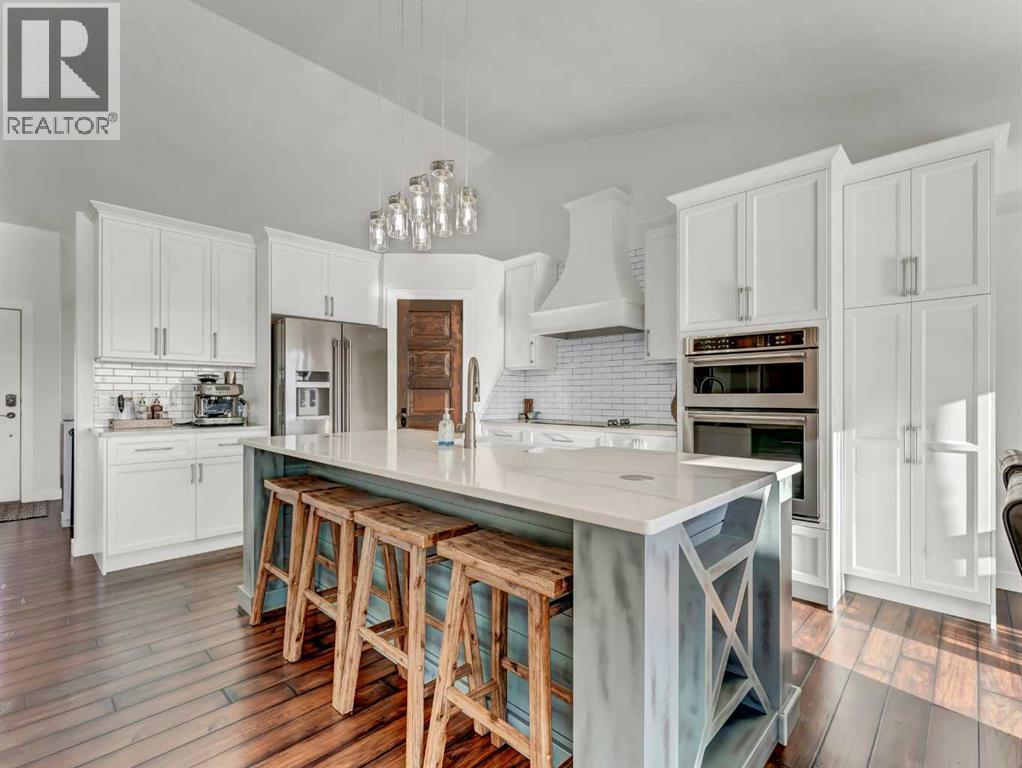 122 Redcliff Way Sw, Redcliff, AB - Indoor Photo Showing Kitchen With Upgraded Kitchen