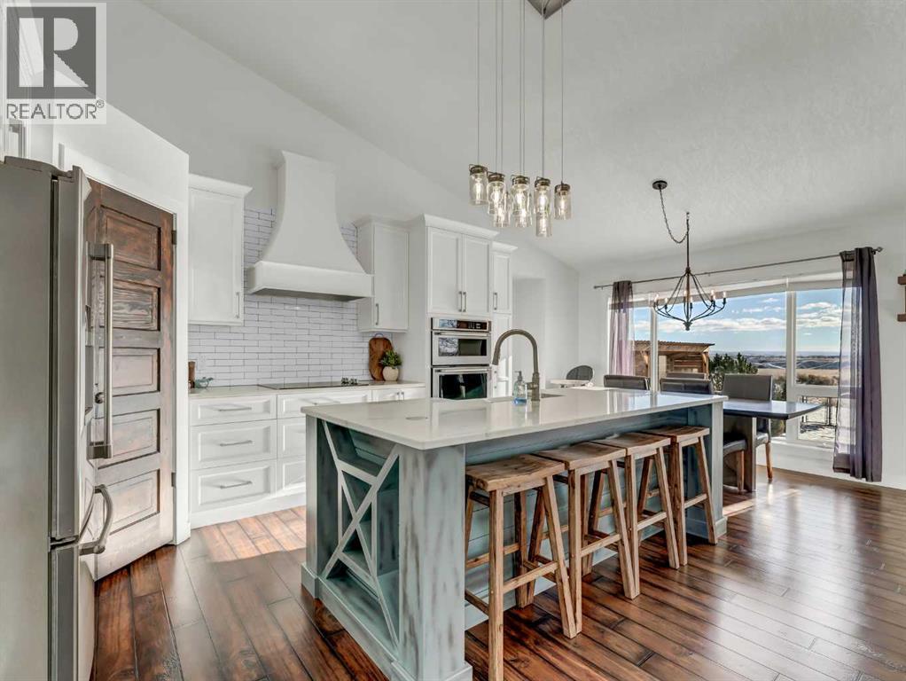 122 Redcliff Way Sw, Redcliff, AB - Indoor Photo Showing Kitchen With Upgraded Kitchen