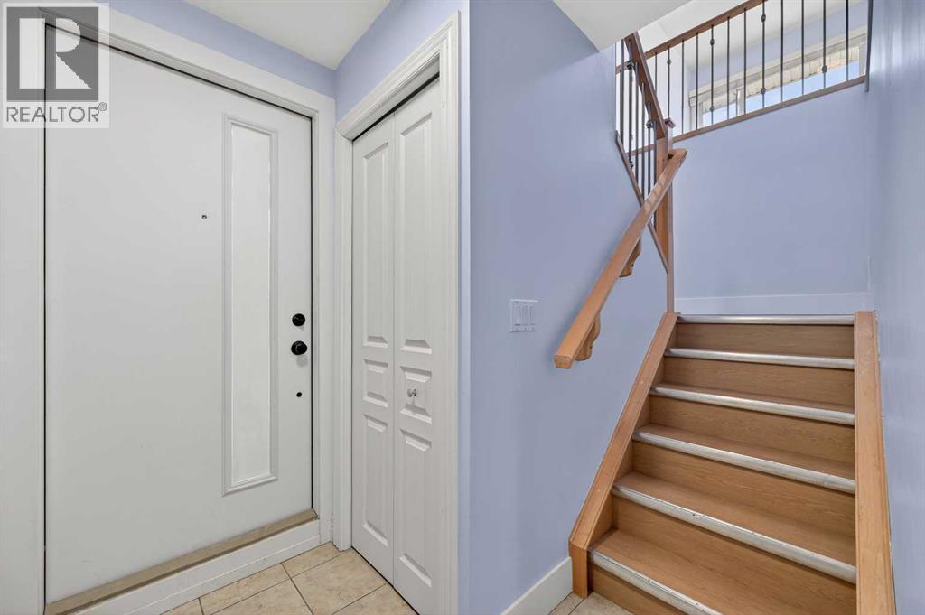 211, 25 Glamis Green Sw, Calgary, AB - Indoor Photo Showing Other Room