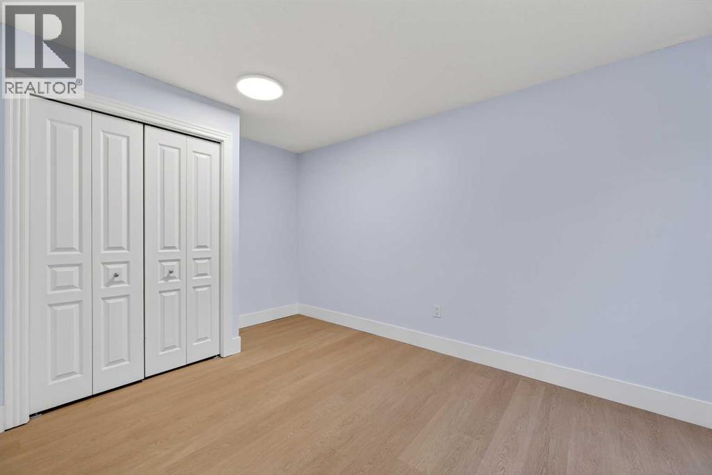 211, 25 Glamis Green Sw, Calgary, AB - Indoor Photo Showing Other Room